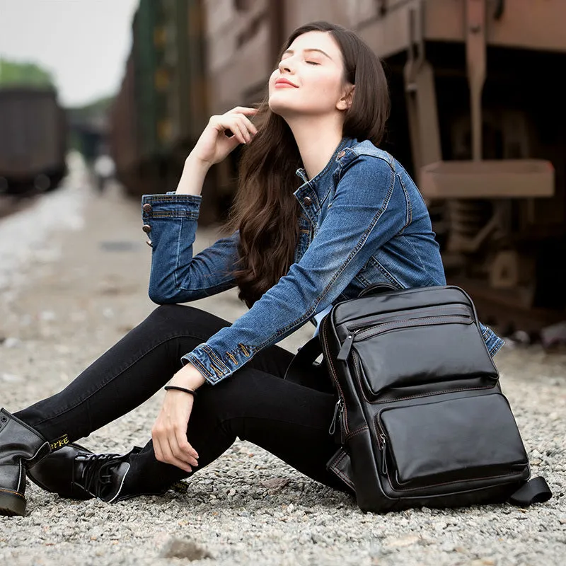 Black cowhide leather backpack 39x30x14cm with zipper closure and sewing thread detailing