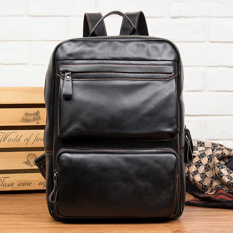 Black cowhide leather backpack 39x30x14cm with zipper closure and sewing thread detailing