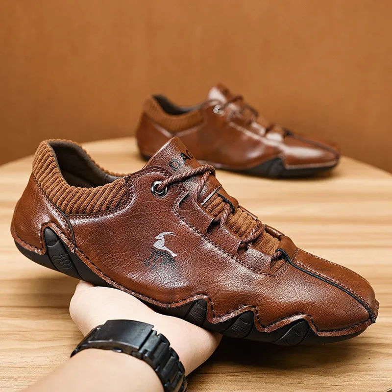 Men's solid colour lace-up casual sneakers with car stitching, blue upper, side view