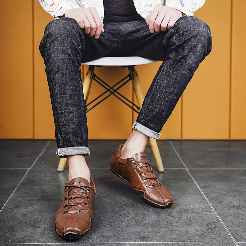 Men's solid colour lace-up casual sneakers with car stitching, blue upper, side view
