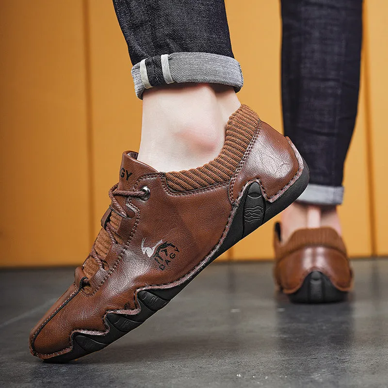 Men's solid colour lace-up casual sneakers with car stitching, blue upper, side view