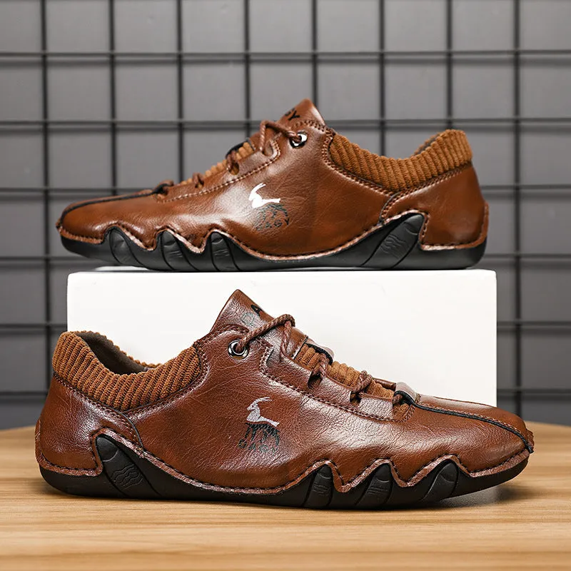 Men's solid colour lace-up casual sneakers with car stitching, blue upper, side view
