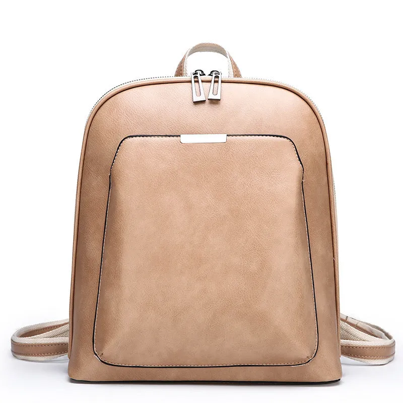 Women's fashion PU backpack in black with shoulder strap and top handle, casual daypack design.