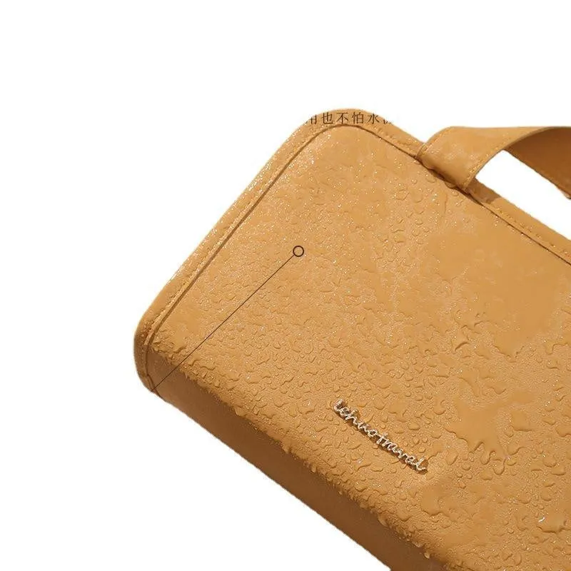 Large capacity leather book cosmetic bag in sunset yellow, open to show interior, with imitation leather finish.