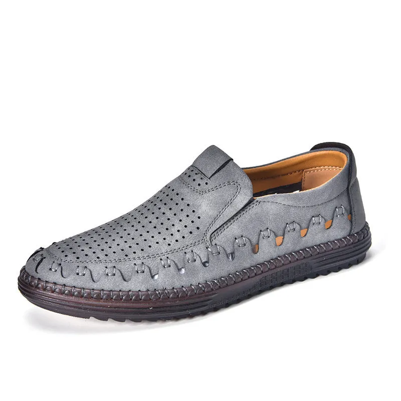 Men's brown handmade leather slip-on casual shoes with flat heel and round toe.
