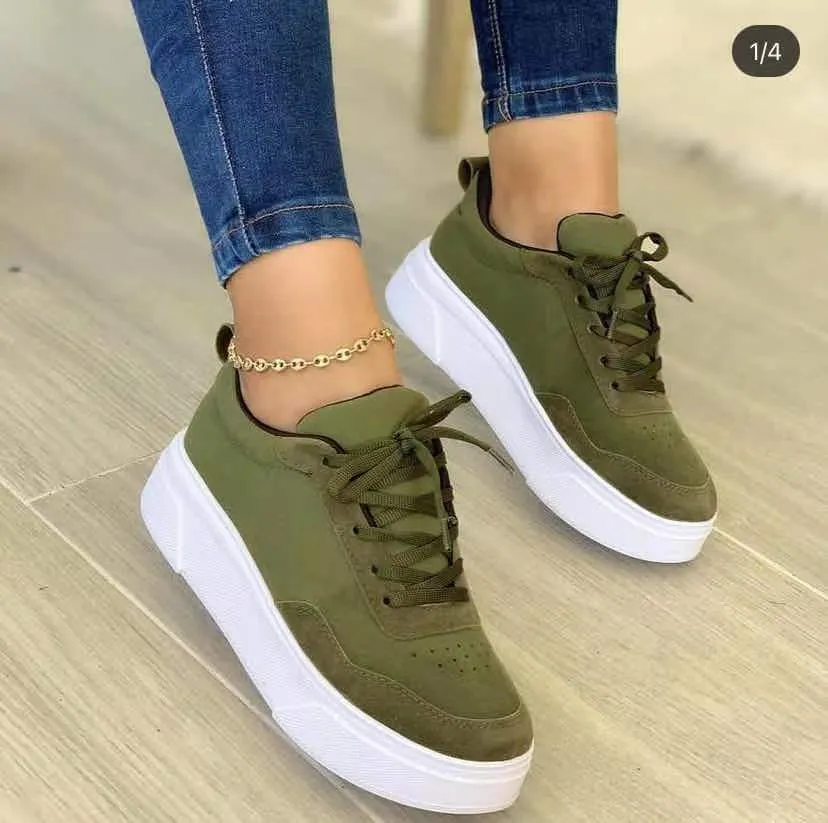 Women's casual lace-up flat sneakers in green with mesh upper and thick rubber sole