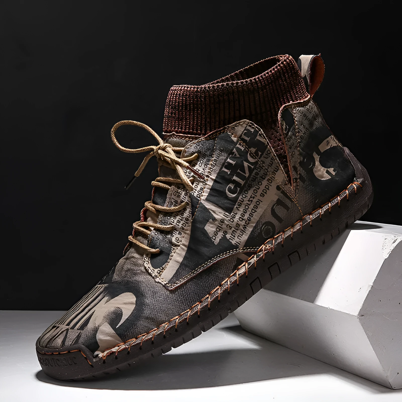 Pair of men's black socks high-top shoes with hand-painted cloth upper and rubber sole for casual winter wear