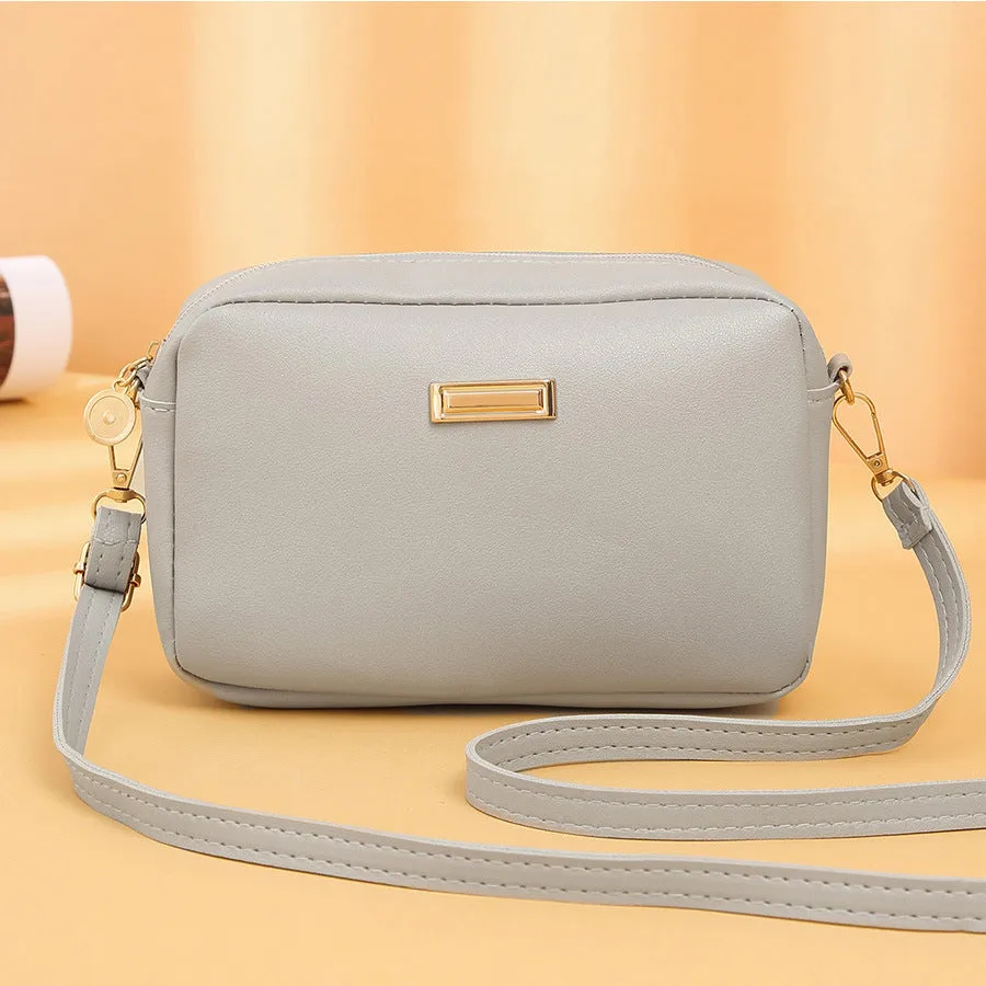 Solid colour PU ladies' shoulder bag in horizontal square shape with three-dimensional pocket.