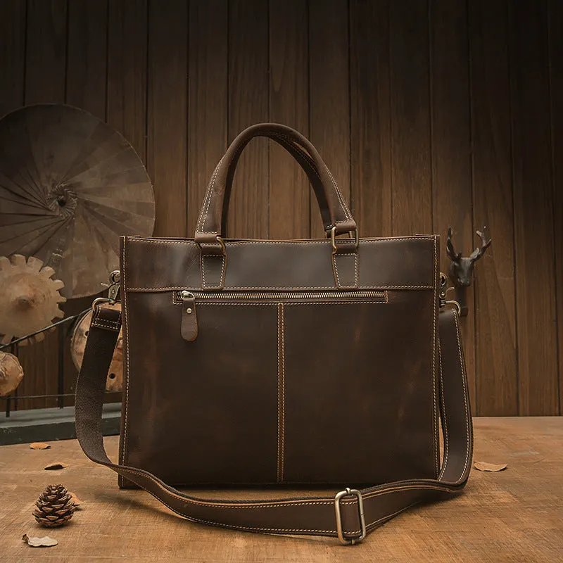 Handmade dark brown leather men's briefcase with top layer cowhide texture holding a 15-inch notebook and folder