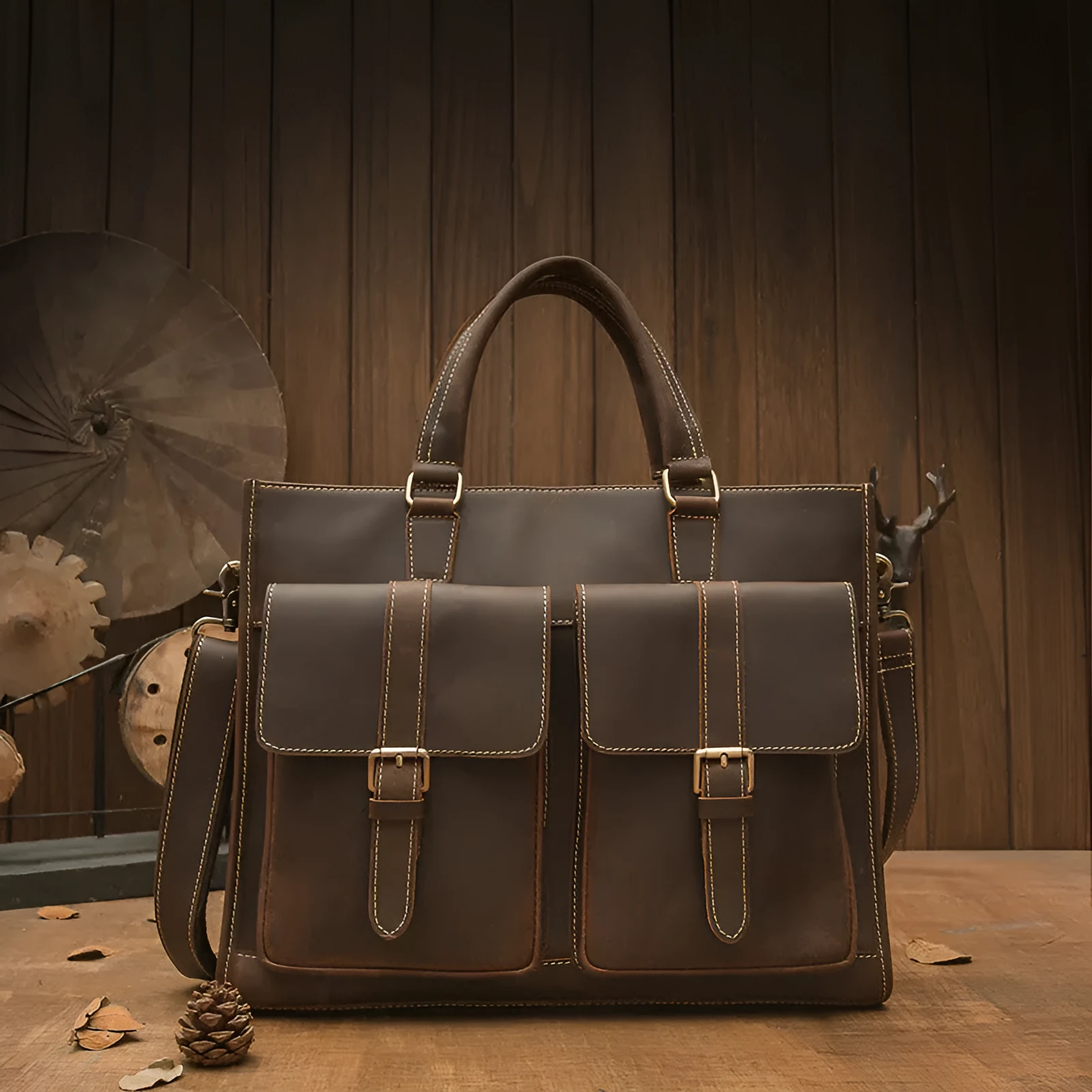 Handmade dark brown leather men's briefcase with top layer cowhide texture holding a 15-inch notebook and folder