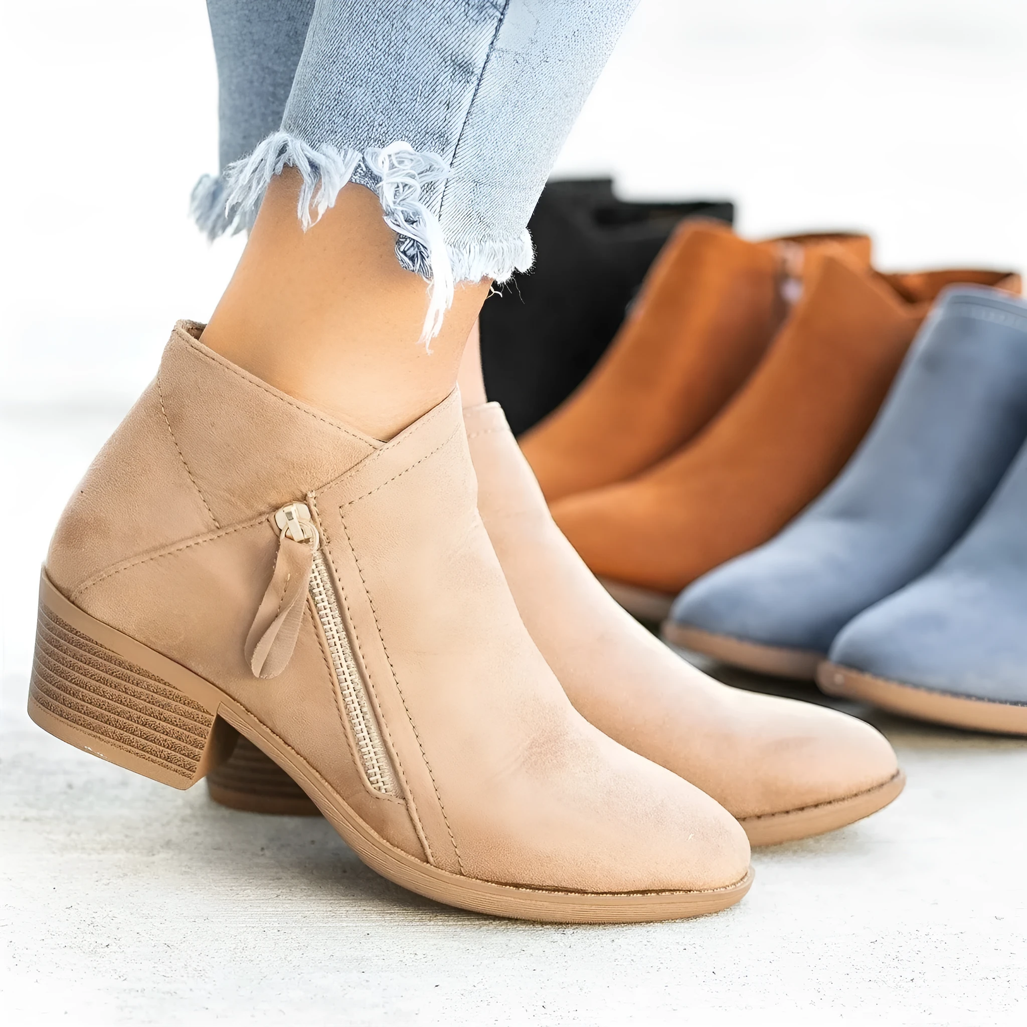 Women’s suede leather ankle boots with side zipper, thick heel, pointed toe, and non-slip sole in beige colour