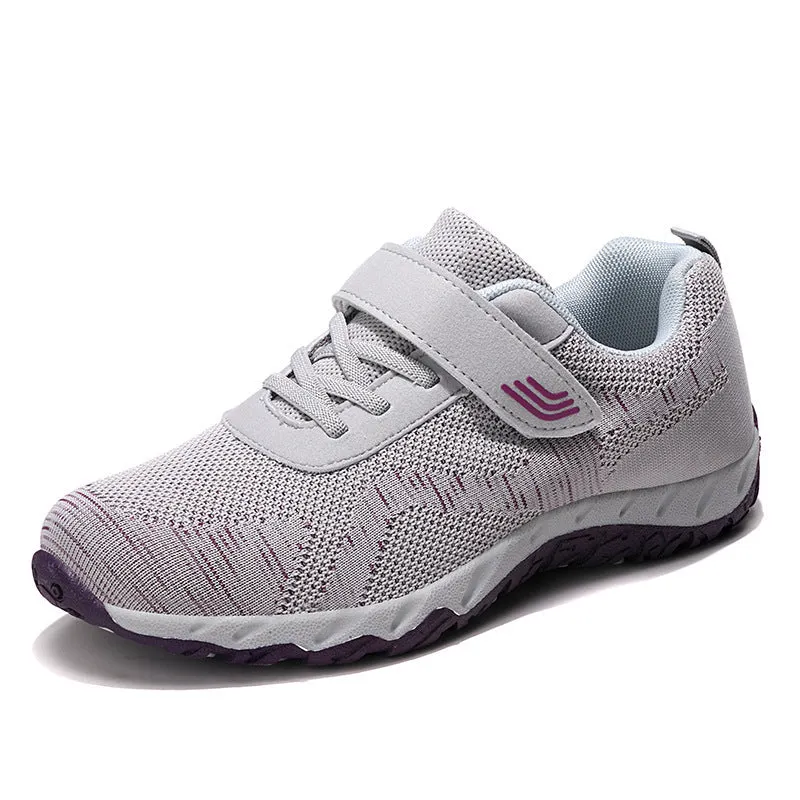 Women's low-top wedge heel shoes in grey purple with velcro strap and mesh upper.