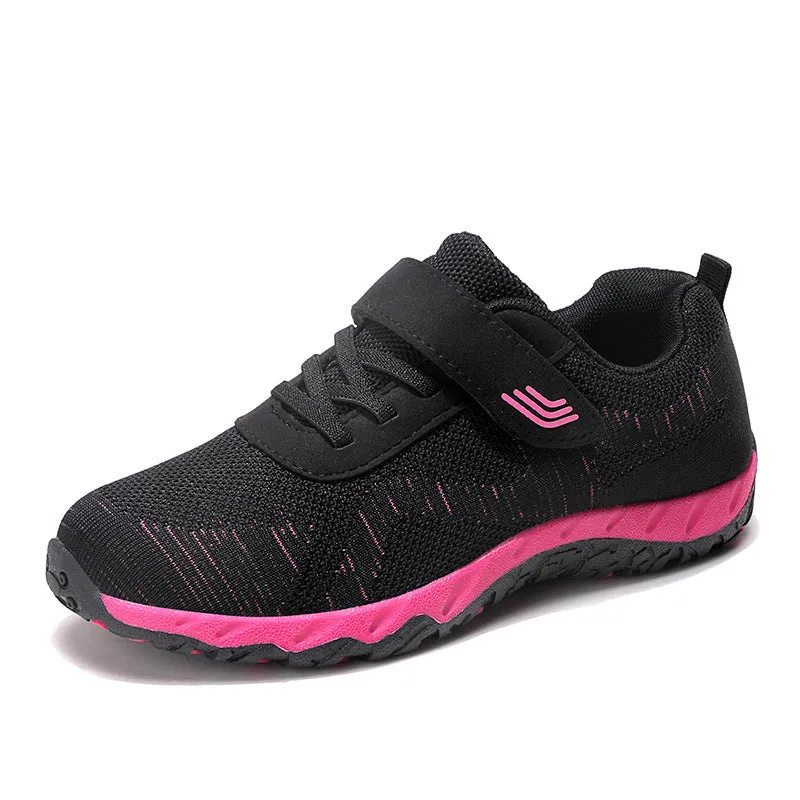 Women's low-top wedge heel shoes in grey purple with velcro strap and mesh upper.