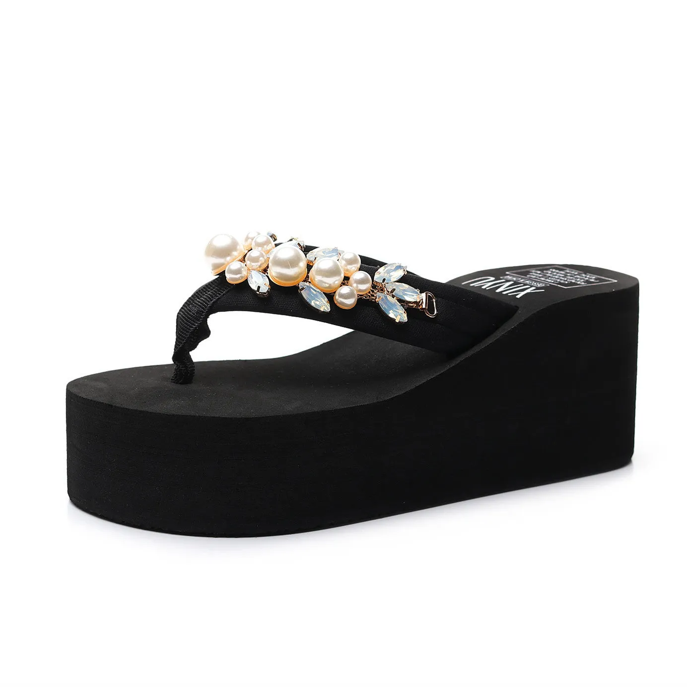 Women's beige high-heeled flip-flop sandals with cotton cloth upper on a light background.
