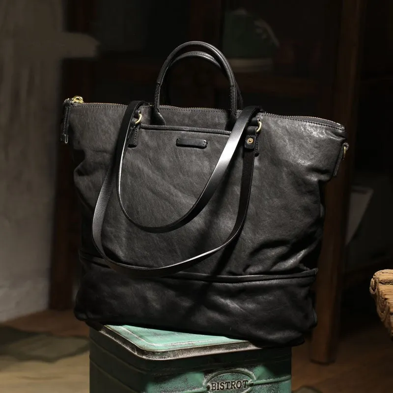 Black handmade vegetable tanned cowhide tote bag with zipper closure and 15-inch computer slot for daily outdoor use