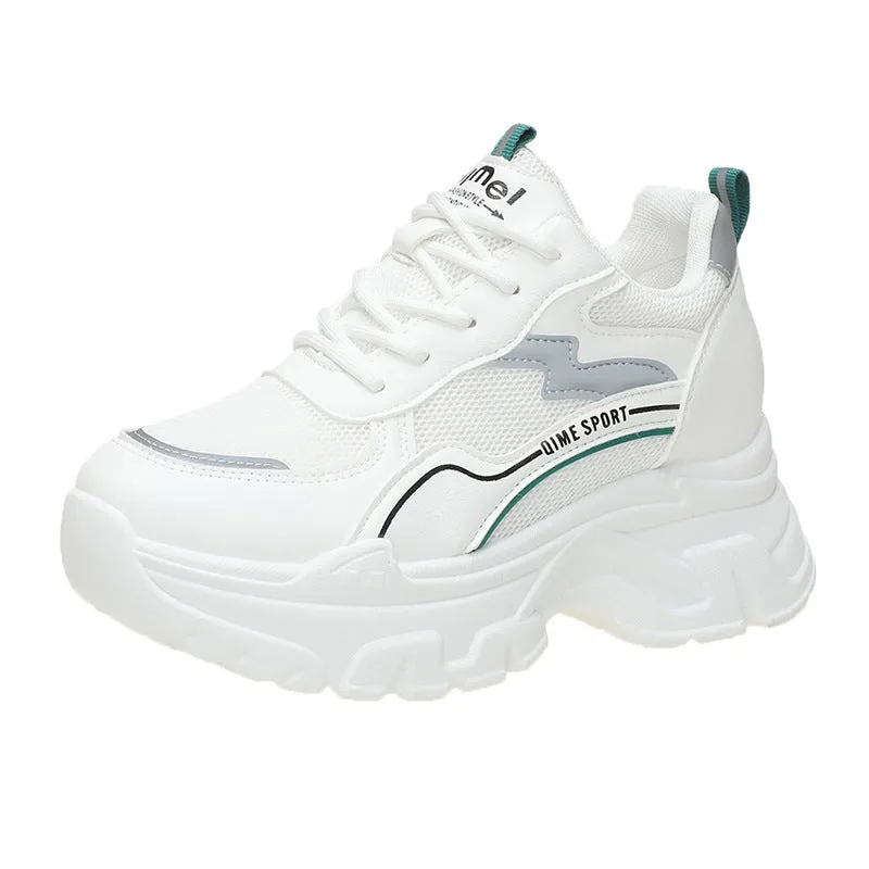 Women's white breathable dad shoes with lace-up front and cross shoulder strap on a rubber sole.