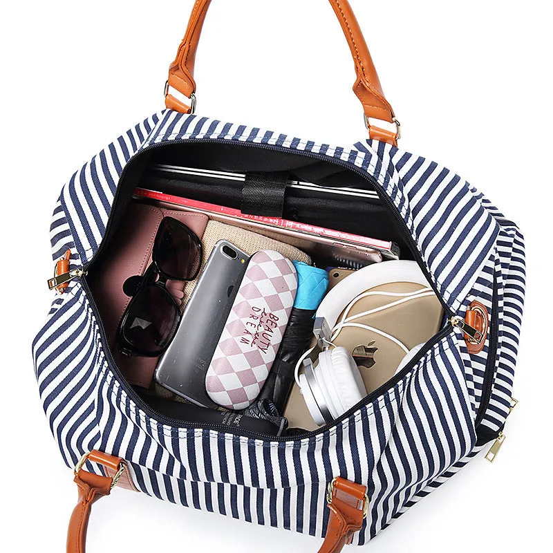 Large canvas striped contrast colour travel duffel bag with zipper closure and polyester lining