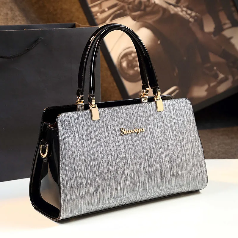 Medium PU leather messenger handbag in horizontal square shape with gold or silver contrast colour