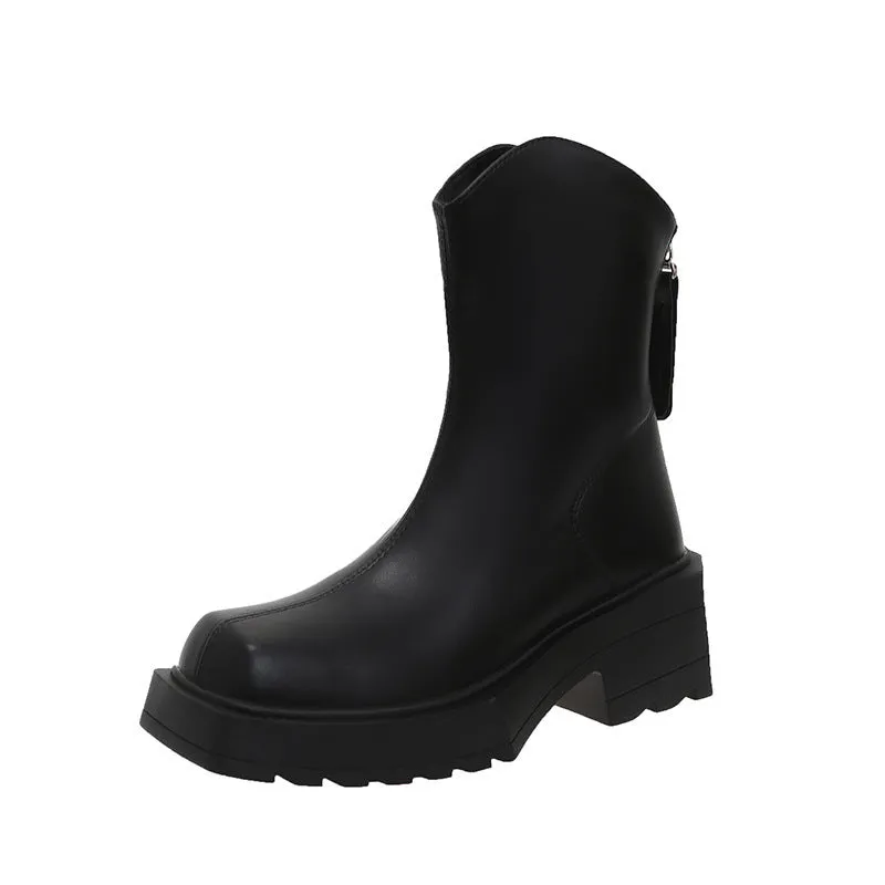 Black platform Martin boots for women with a square toe and back zipper.