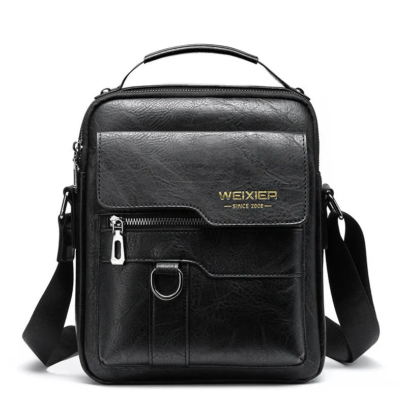 Men's retro messenger bag in black PU leather with flap closure and one-shoulder strap, displayed on a solid background
