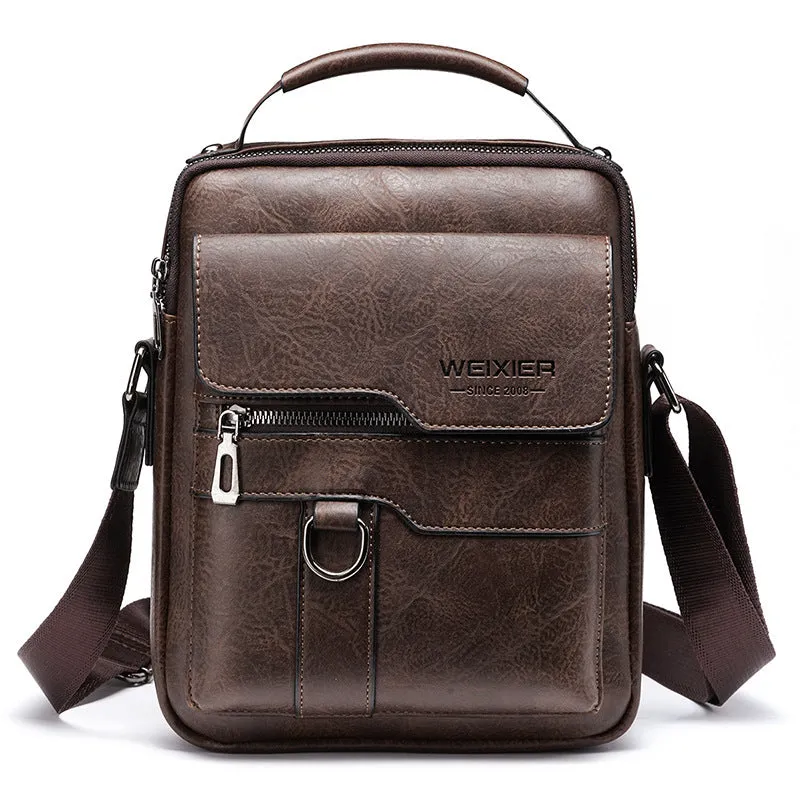 Men's retro messenger bag in black PU leather with flap closure and one-shoulder strap, displayed on a solid background
