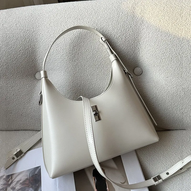 Genuine cowhide leather crossbody shoulder bag in dumpling shape with sandwich pocket and six colour options