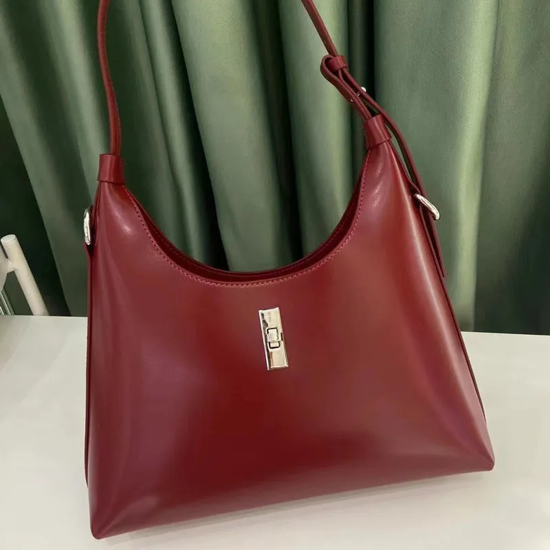 Genuine cowhide leather crossbody shoulder bag in dumpling shape with sandwich pocket and six colour options