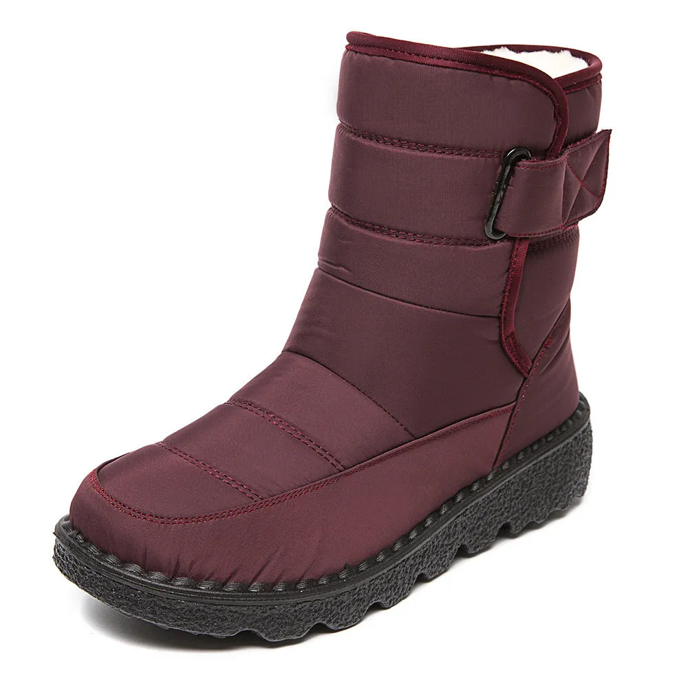 Women's waterproof snow boots with canvas upper, PU sole, buckle closure, and belt decoration