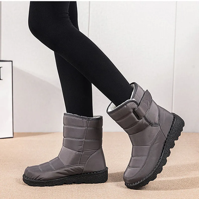 Women's waterproof snow boots with canvas upper, PU sole, buckle closure, and belt decoration