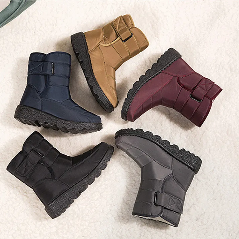 Women's waterproof snow boots with canvas upper, PU sole, buckle closure, and belt decoration