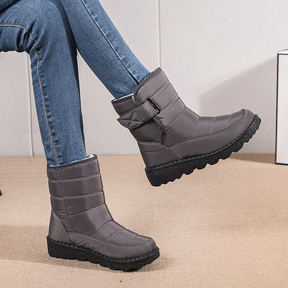 Women's waterproof snow boots with canvas upper, PU sole, buckle closure, and belt decoration