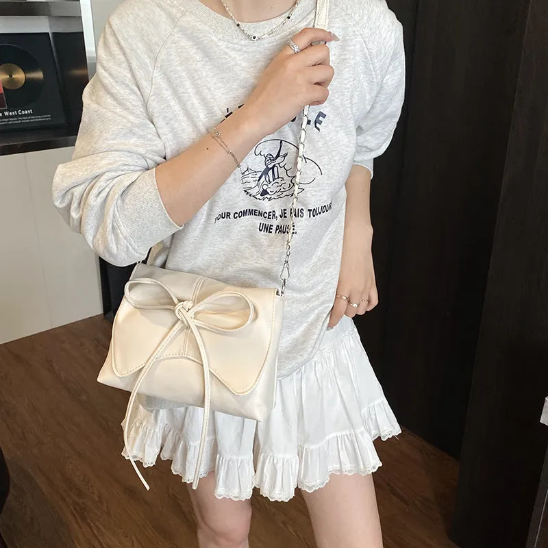 Women's horizontal square underarm crossbody bag in PU leather with sewing line details and mobile phone pocket