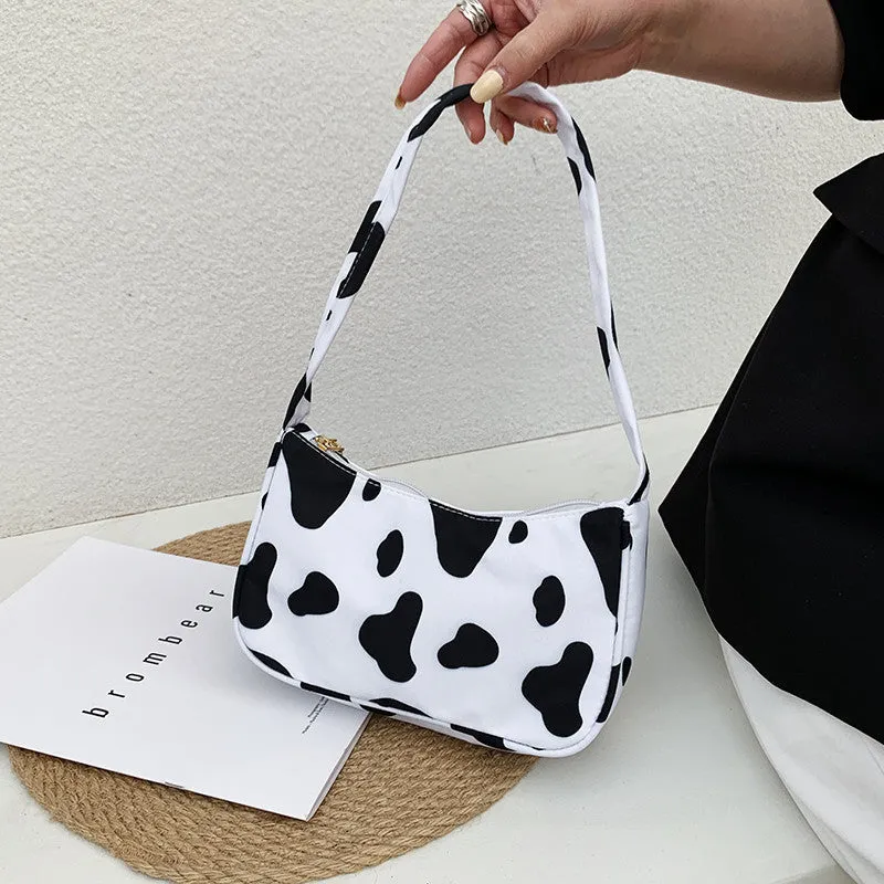 Women's small nylon underarm bag with leopard print pattern and zipper closure, 23cm size