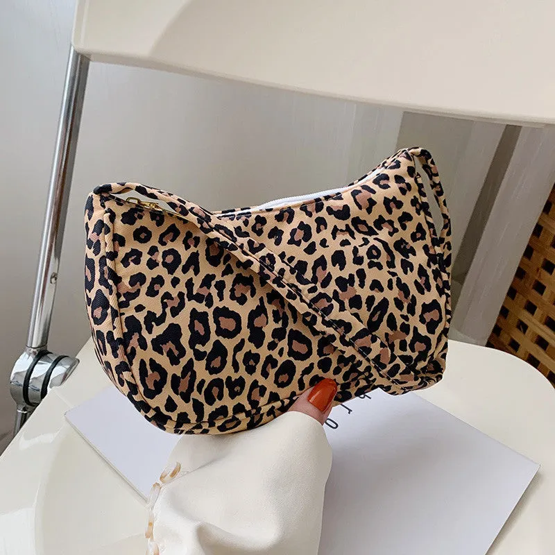 Women's small nylon underarm bag with leopard print pattern and zipper closure, 23cm size