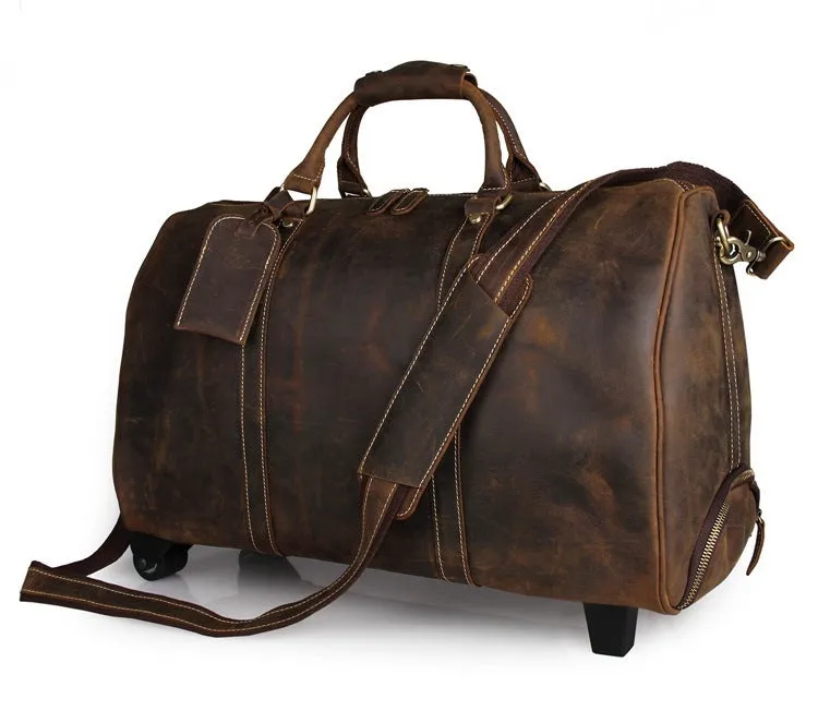 21 inch cowhide leather trolley bag in brown glossy finish, front view showing handle and wheels