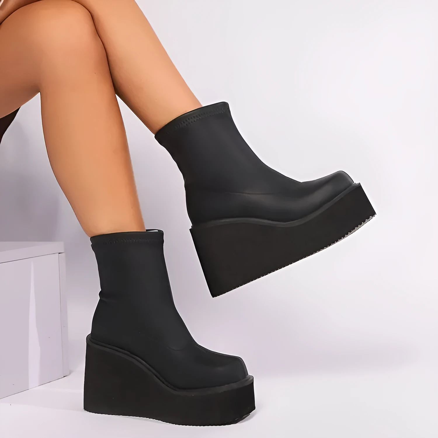 Plus size women's black wedge heel ankle boots with waterproof platform sole and round toe