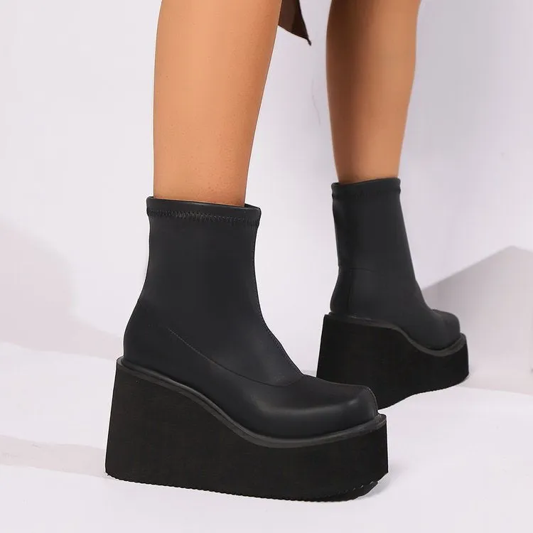 Plus size women's black wedge heel ankle boots with waterproof platform sole and round toe