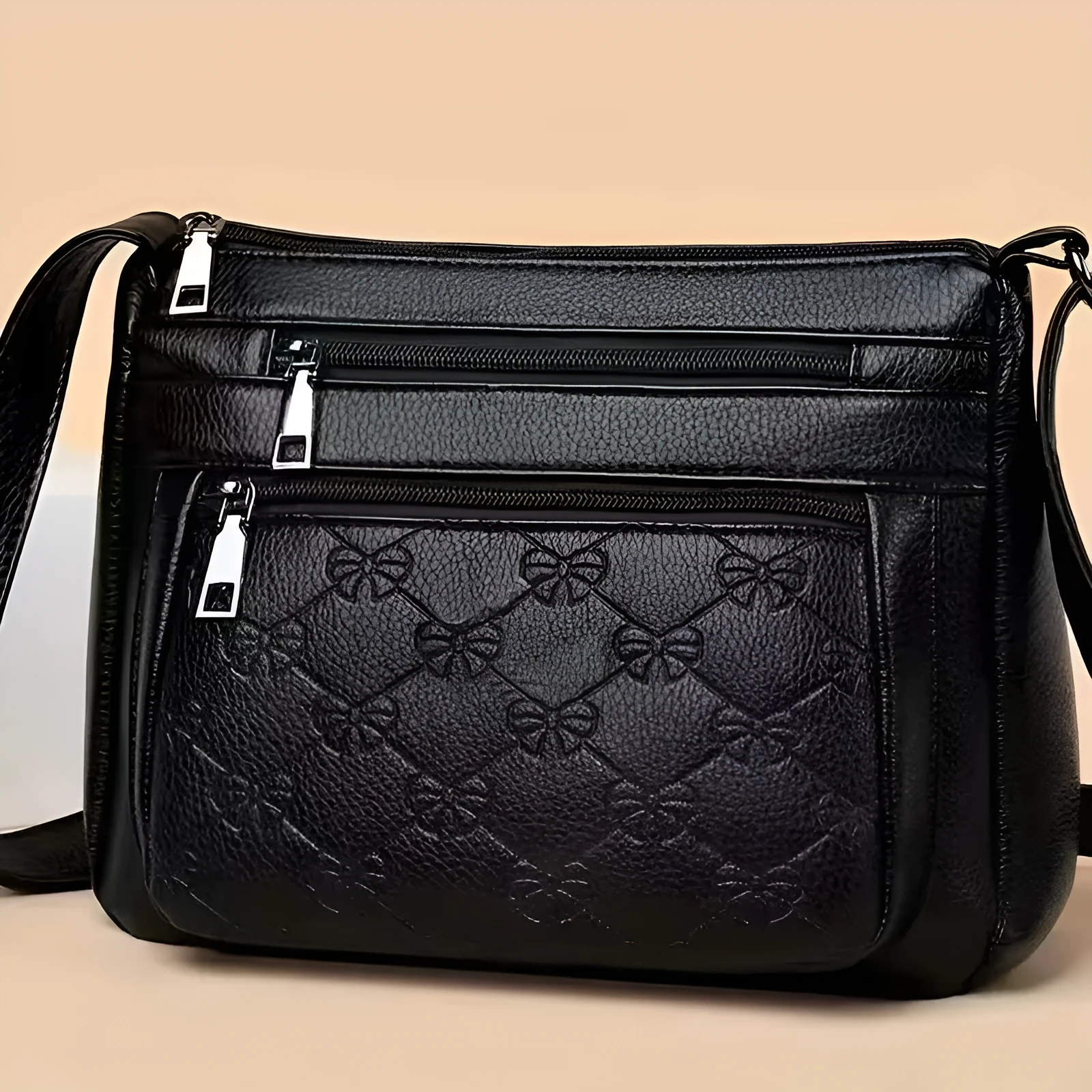 Butterfly Black women's PU shoulder messenger bag with crossbody strap and embossed details.