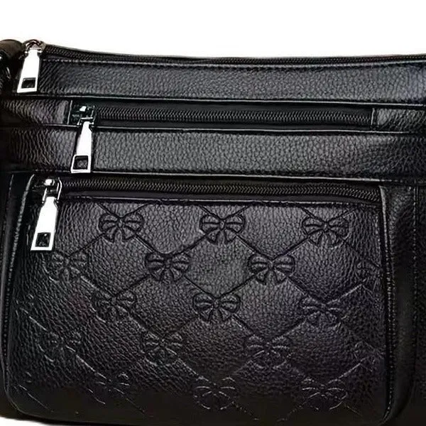 Butterfly Black women's PU shoulder messenger bag with crossbody strap and embossed details.