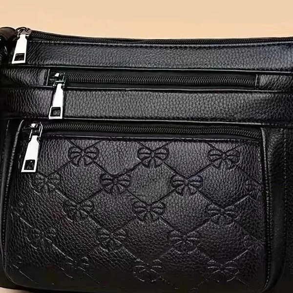 Butterfly Black women's PU shoulder messenger bag with crossbody strap and embossed details.