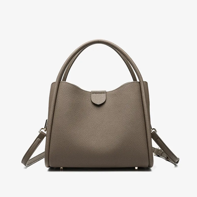 Genuine leather cylindrical handbag in black with open pocket and sewing thread detailing