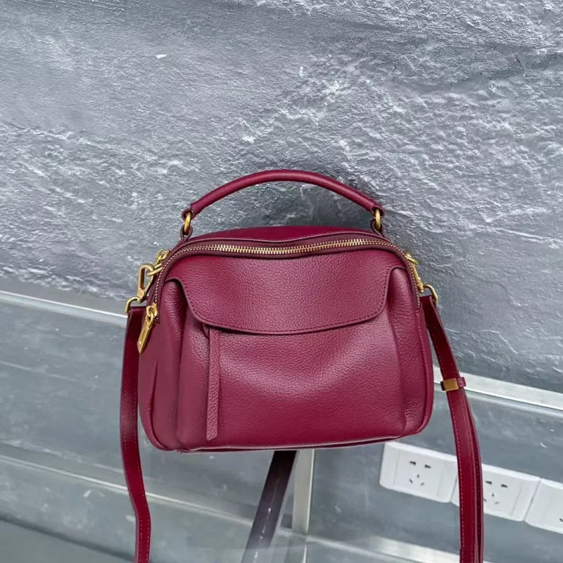 Genuine leather multi-compartment shoulder handbag in almond white with sewing thread detail and outer sandwich pocket