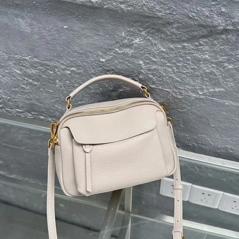 Genuine leather multi-compartment shoulder handbag in almond white with sewing thread detail and outer sandwich pocket