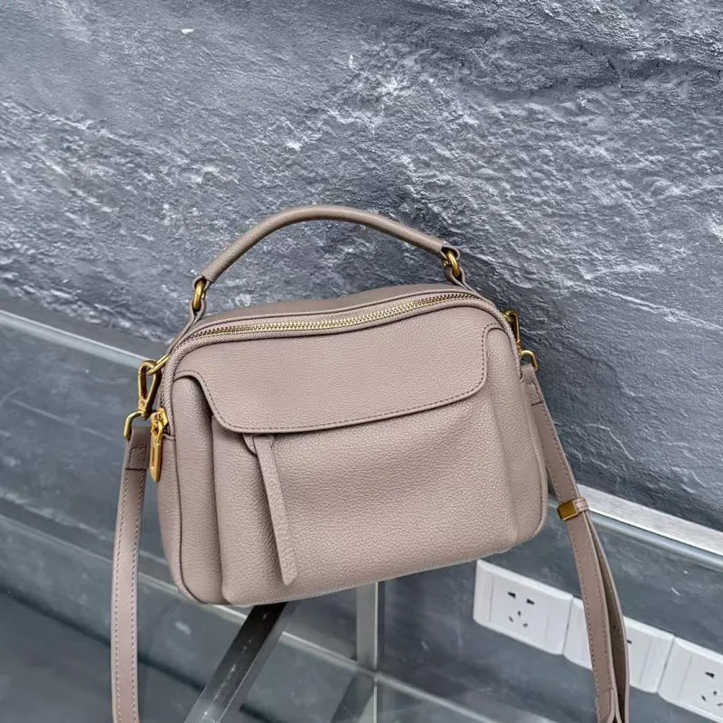 Genuine leather multi-compartment shoulder handbag in almond white with sewing thread detail and outer sandwich pocket