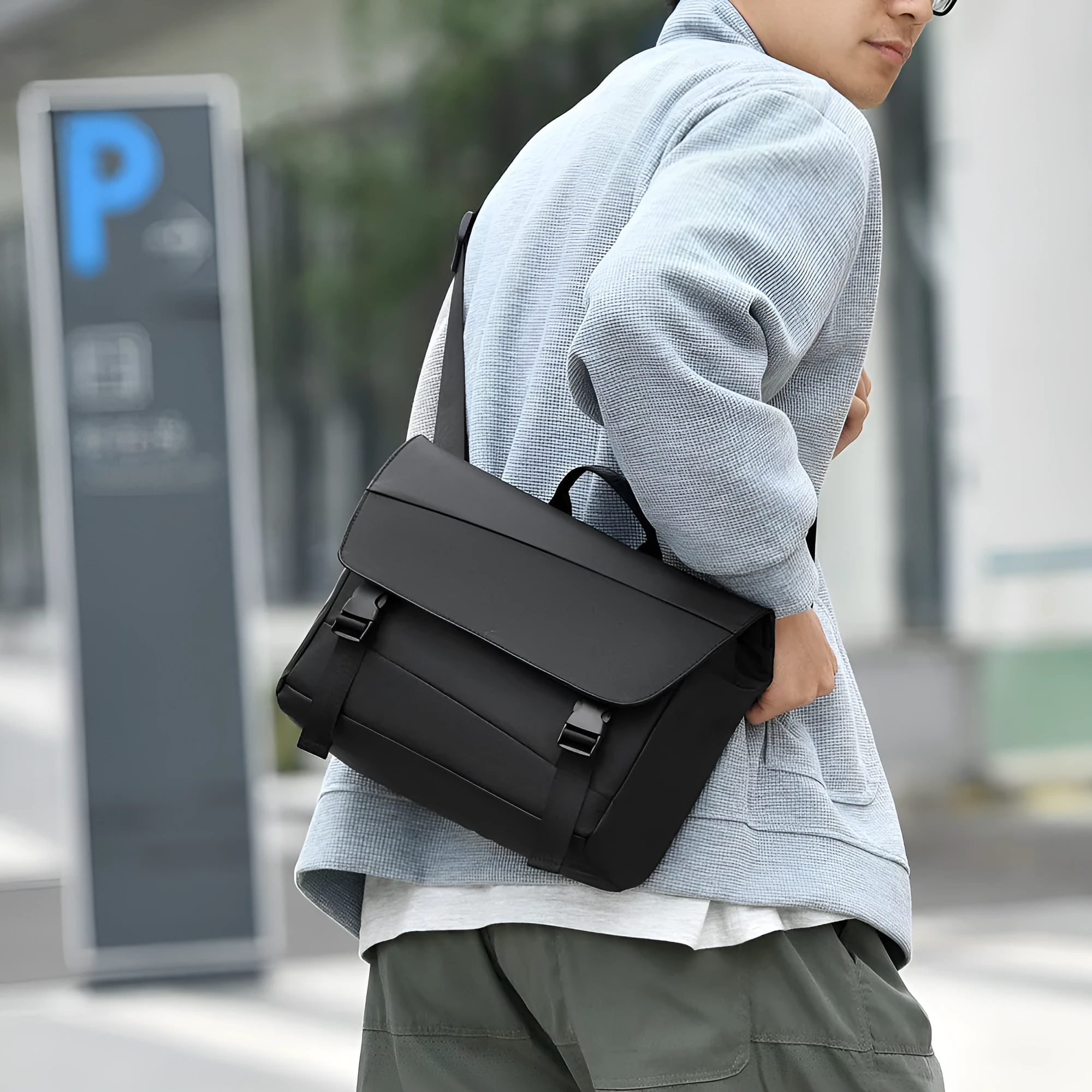Men's black shoulder bag with large capacity, Derm material, visible sewing line detail, urban simplicity style