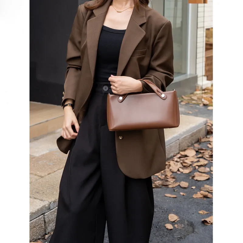 Genuine leather messenger shoulder bag in Wine Red, horizontal square shape, visible sewing thread detailing