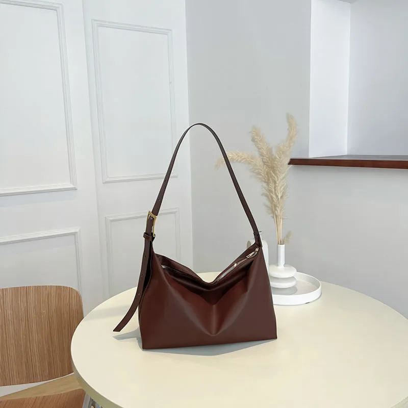 Large capacity simple PU tote bag in black, brown, or coffee colour with single shoulder strap and no lining