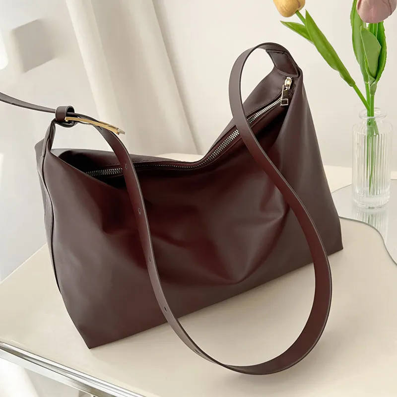 Large capacity simple PU tote bag in black, brown, or coffee colour with single shoulder strap and no lining