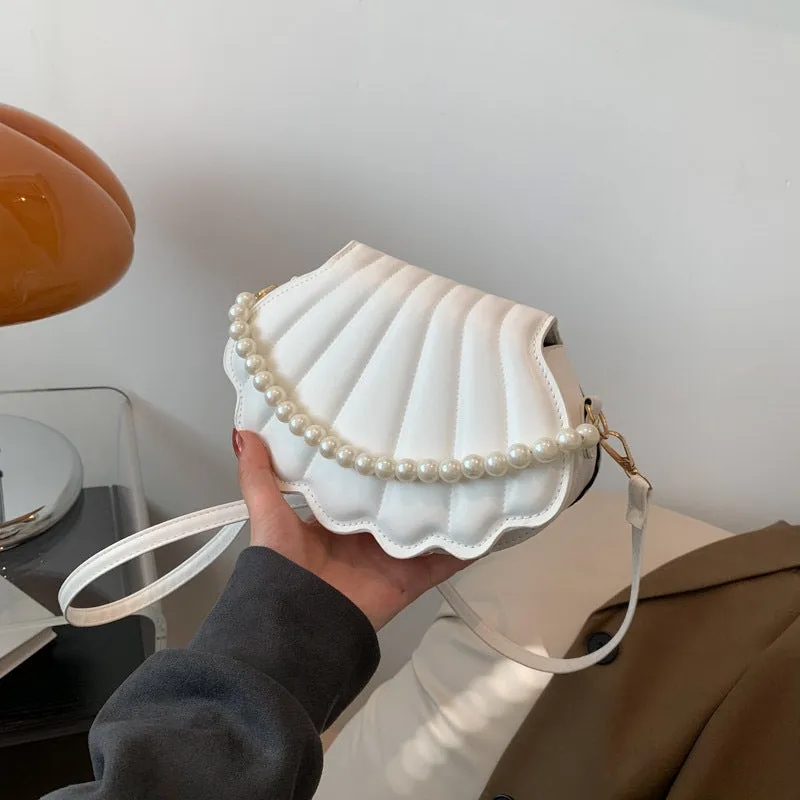 Women's simple messenger bag in PU shell shape with single shoulder strap, available in multiple colours