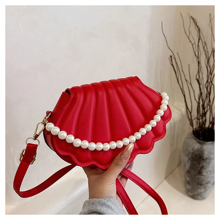 Women's simple messenger bag in PU shell shape with single shoulder strap, available in multiple colours